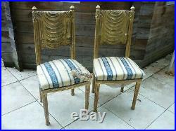 2 Chaises en bois doré style Louis XVI, dossier plein en bois doré