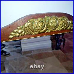 Beau miroir biseauté en bois et bronze Art Deco