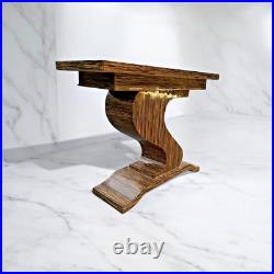 Console Art Déco élégante avec pied en S sculpté et motifs décoratifs