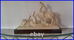 Couple d'antilopes en faïence signé Charles Lemanceau Art déco, avec socle bois