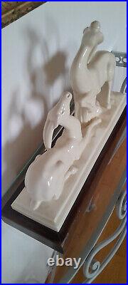 Couple d'antilopes en faïence signé Charles Lemanceau Art déco, avec socle bois