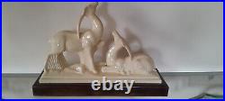 Couple d'antilopes en faïence signé Charles Lemanceau Art déco, avec socle bois