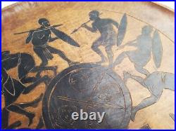 GRAND PLAT EN BOIS GRAVÉ AFRICANISTE époque ART DÉCO à décor de guerriers