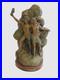 Groupe_art_deco_en_regule_sujet_couple_en_detresse_sur_socle_bois_XX_siecle_01_ufv