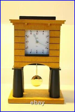 Horloge à pendule de table en placage de bois MANTEL CLOCK By Alessi Designer