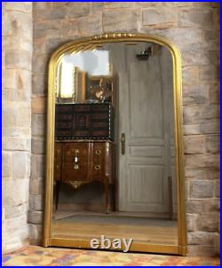 Miroir Ancien Époque Art Déco En Bois / Stuc Doré Surmonté D'une Frise De Fleurs Miroir Ancien Époque Art Déco En Bois / Stuc Doré Surmonté D'une Frise De Fleurs