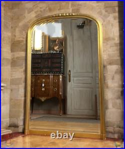 Miroir Ancien Époque Art Déco En Bois / Stuc Doré Surmonté D'une Frise De Fleurs Miroir Ancien Époque Art Déco En Bois / Stuc Doré Surmonté D'une Frise De Fleurs