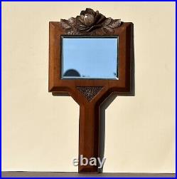 Miroir à main en bois sculpté vers 1930 Art Déco