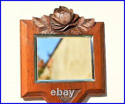 Miroir à main en bois sculpté vers 1930 Art Déco