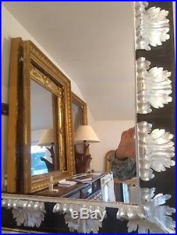 Miroir en bois sculpté doré et aquarellé