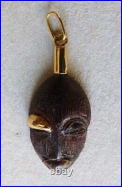 Pendentif en bois et OR en forme de masque africain Bijou ancien