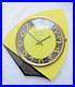 Pendule_murale_a_pile_formica_1960_R_ROUSSEL_Depose_horloge_Art_Deco_01_zu
