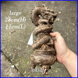 Sculpture de dragon chinois sculpté à la main en bois d'agar, statue d'art Sculpture de dragon chinois sculpté à la main en bois d'agar, statue d'art