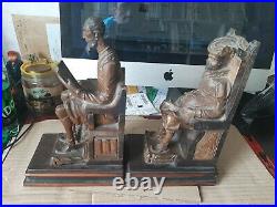 Serre livres Don quichotte et Sancho Pancha en bois sculpté. Hauteur 24 cm